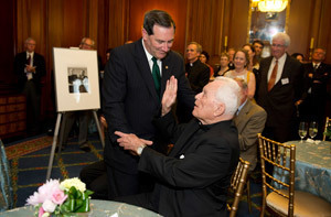 Father Hesburgh blesses Indiana U.S. Sen. Joe Donnelly during the reception