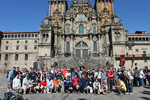 The Glee Club gathers in front of the Cathedral of St. James after finishing the Camino