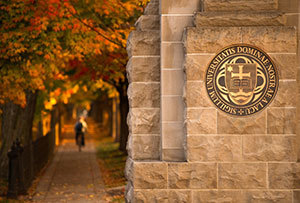 The University seal as seen from Notre Dame Avenue