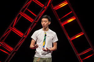 Peter Woo speaks at the 2014 TEDxUND event
