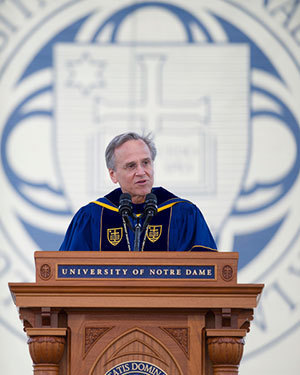 Rev. John I. Jenkins, C.S.C., president of the University of Notre Dame, speaks at the 2014 Commencement ceremony in Notre Dame Stadium
