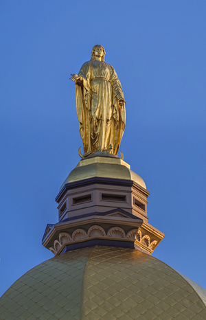 Mary statue on top of golden dome