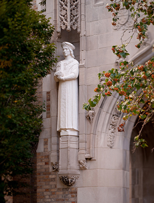 Statue of St. Thomas More on the west entrance to Biolchini Hall
