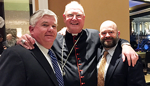 David Bender, chairman of the CEC advisory board, left, with Cardinal Timothy Dolan and Carter Snead at the Synod on the Family