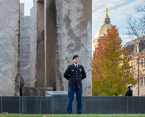 ROTC cadets and midshipmen stand at attention for vigil at the Clarke Memorial Fountain in honor of Veterans Day