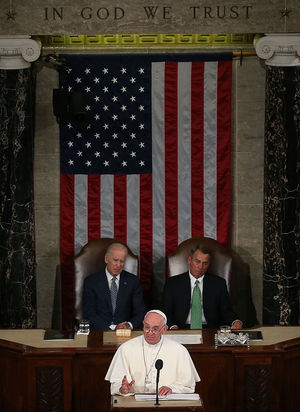 Pope Francis addresses a joint meeting of the U.S. Congress while Vice President Joseph Biden and House Speaker John Boehner (R-OH) listen, at the U.S. Capitol on September 24, 2015 in Washington, D.C. (Photo by Mark Wilson/Getty Images)