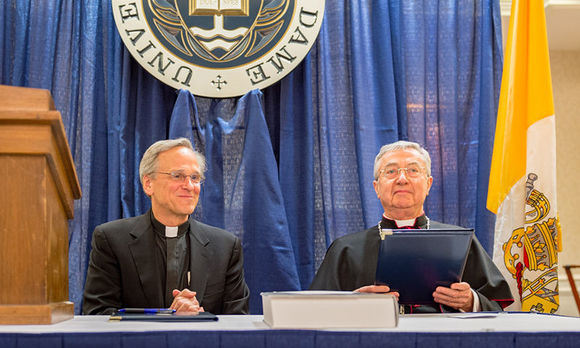 Rev. John I. Jenkins, C.S.C., and Archbishop Jean-Louis Brugues, archivist and librarian of the Holy Roman Church, sign a memorandum of understanding for collaboration and exchanges between the Vatican Library and Notre Dame