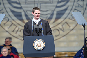 Salutatorian Stephen Schafer delivers the invocation at the 2016 University Commencement Ceremony