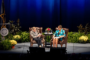 United States Supreme Court Justice Ruth Bader Ginsburg reads from a pocket copy of the United States Constitution during a conversation with U.S. Court of Appeals Judge Ann Claire Williams