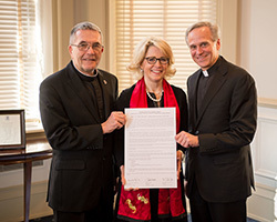 Brother John Paige, C.S.C., president of Holy Cross College, Jan Cervelli, president of Saint Mary's College and Rev. John I. Jenkins, C.S.C., president of The University of Notre Dame