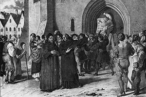 Martin Luther Hammers the 95 Theses to the Church Door of Wittenberg
