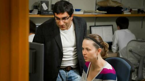 Professor Nitesh Chawla works with a student in the Center for Network and Data Science. Photo by Matt Cashore/University of Notre Dame.