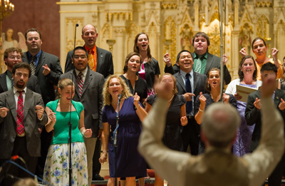In August 1993, the Folk Choir was one of a handful of American choirs invited to sing for World Youth Day in Denver, Colorado, and for His Holiness John Paul II at the concluding Papal Liturgy.  It is under the direction of Steven Warner along with assistant director Karen Schneider-Kirner.