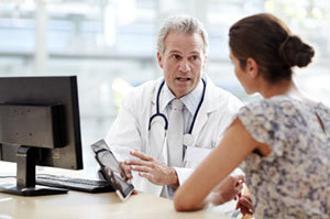 Doctor discusses with patient
