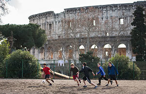 Undergraduate School of Architecture students play soccer next to the Colosseum, near the Notre Dame Rome Centre