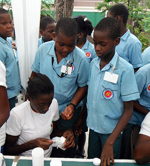 Children at JUVENAT School in Haiti receive their annual medication from the Notre Dame Haiti Program to prevent lymphatic filariasis