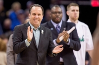 Head coach Mike Brey smiles in the first half of the 2015 NCAA Tournament regional final against Kentucky