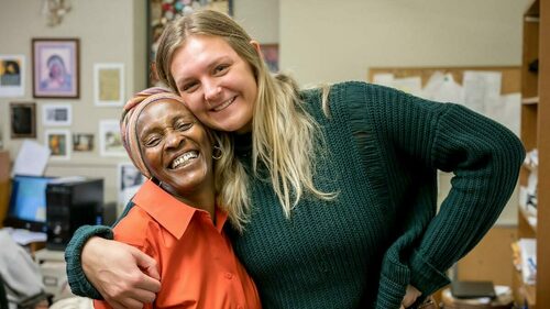 Senior Rebecca Nunge, right, poses for a photo with Debra Stanley, founder of the nonprofit Imani Unidad. Photo by Matt Cashore/University of Notre Dame.