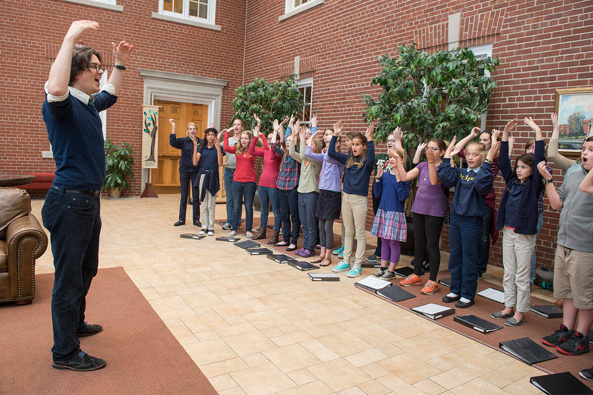 Mark Doerries, associate director of Sacred Music at Notre Dame, rehearses with the Notre Dame Children's Choir.