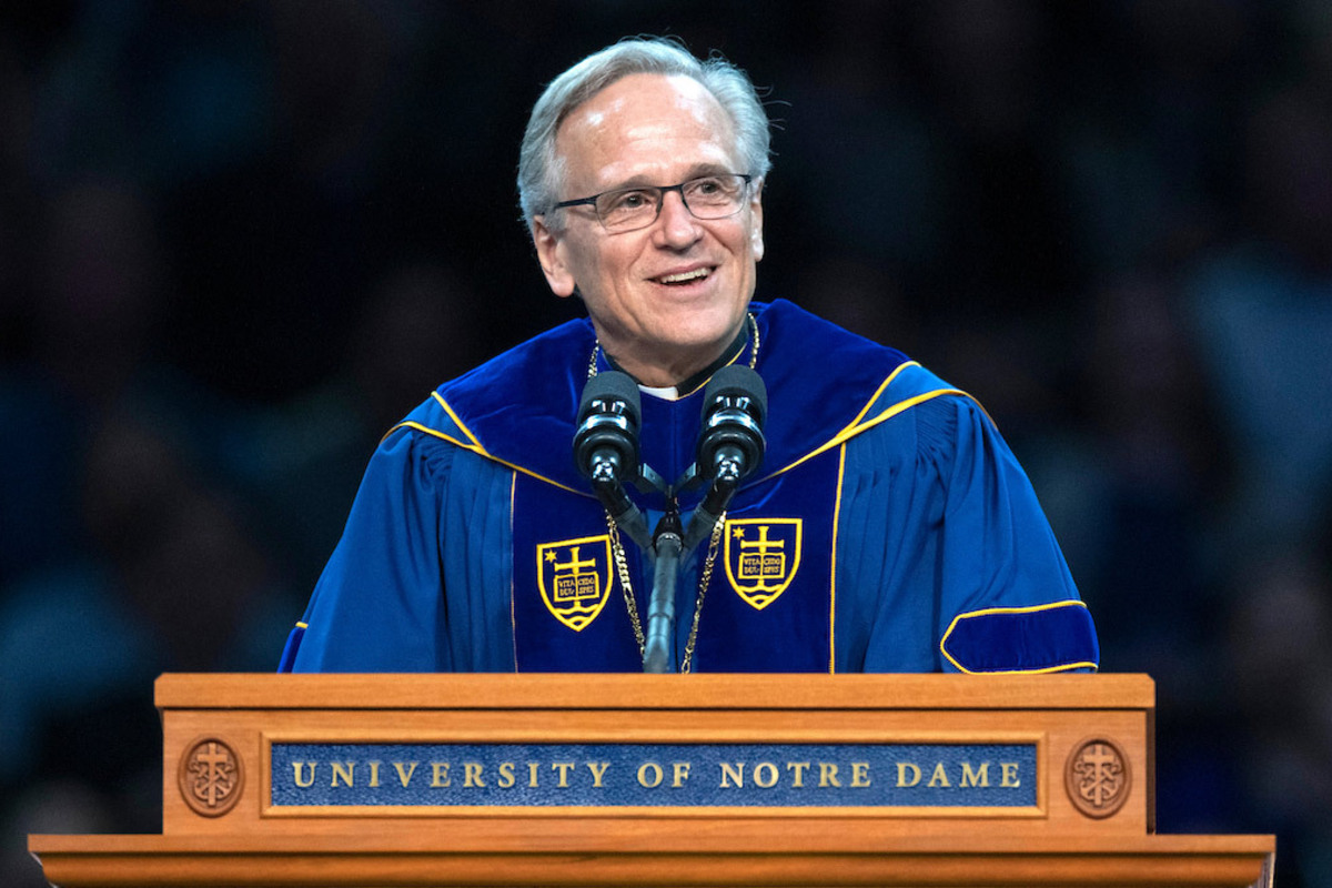 University of Notre Dame President Rev. John I. Jenkins, C.S.C., introduces commencement speaker Peggy Noonan, Pulitzer Prize-winning columnist for the Wall Street Journal, during the 2019 Commencement ceremony n the Purcell Pavilion. Photo by Barbara Johnston/University of Notre Dame.