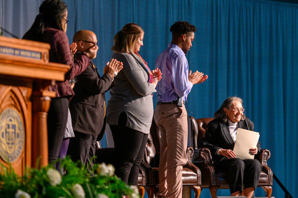 Diane Nash, a leader in the 1960s civil rights movement, is honored with a standing ovation at the conclusion of the 2020 Martin Luther King Jr. Celebration Luncheon. Photo by Matt Cashore/University of Notre Dame.