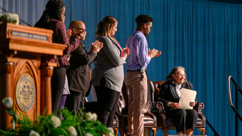Diane Nash, a leader in the 1960s civil rights movement, is honored with a standing ovation at the conclusion of the 2020 Martin Luther King Jr. Celebration Luncheon. Photo by Matt Cashore/University of Notre Dame.