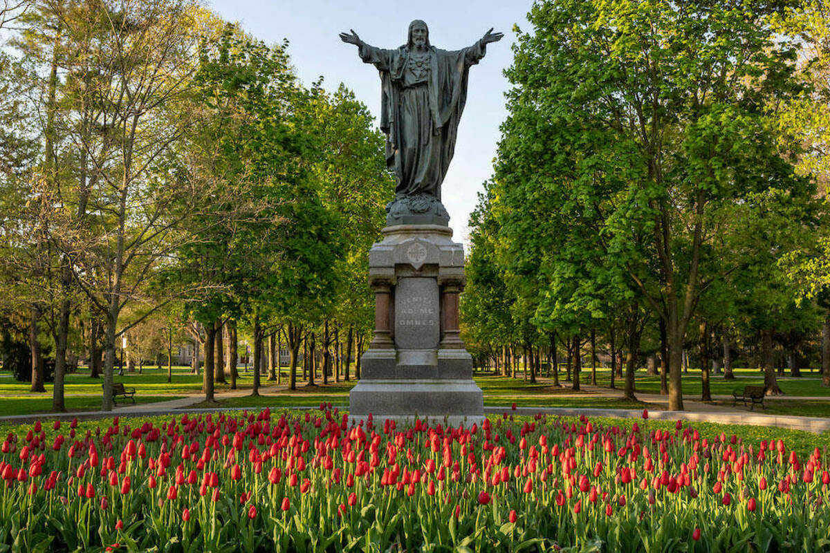The Sacred Heart of Jesus statue in the Main Quad during spring, 2020. Photo by Barbara Johnston/University of Notre Dame.