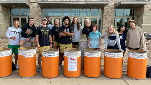 Student-athletes representing women’s basketball, hockey, baseball, women’s lacrosse and more accepted donations of canned and boxed foods and baking products