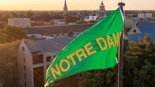 Green Notre Dame pennant over the north end of Notre Dame Stadium (Photo by Matt Cashore/University of Notre Dame)