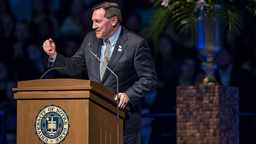 Joe Donnelly speaks during a tribute ceremony in the Purcell Pavilion to honor the life of the late President Emeritus Rev. Theodore M. Hesburgh, C.S.C. (Photo by Barbara Johnston/University of Notre Dame)