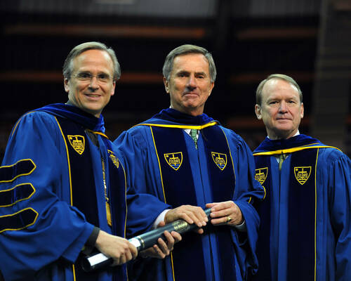 Notre Dame Trustee Fritz Duda (center) received an honorary degree in 2009 from President Rev. John I. Jenkins, C.S.C., (left) and then-Board chair Richard Notebaert