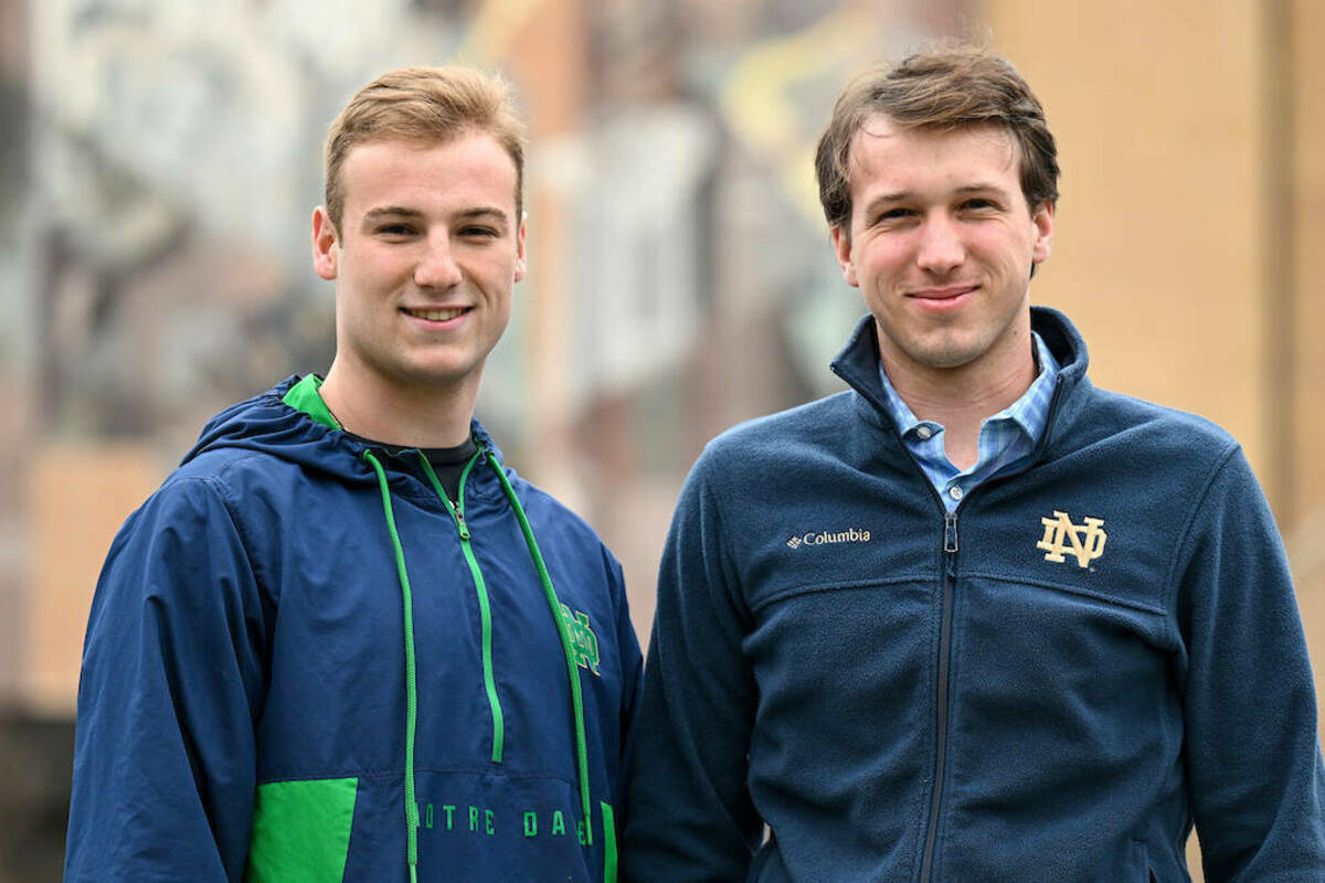 Mike Oblich, left, and Jack Zagrocki photographed outside Hesburgh Library. (Photo by Matt Cashore/University of Notre Dame)