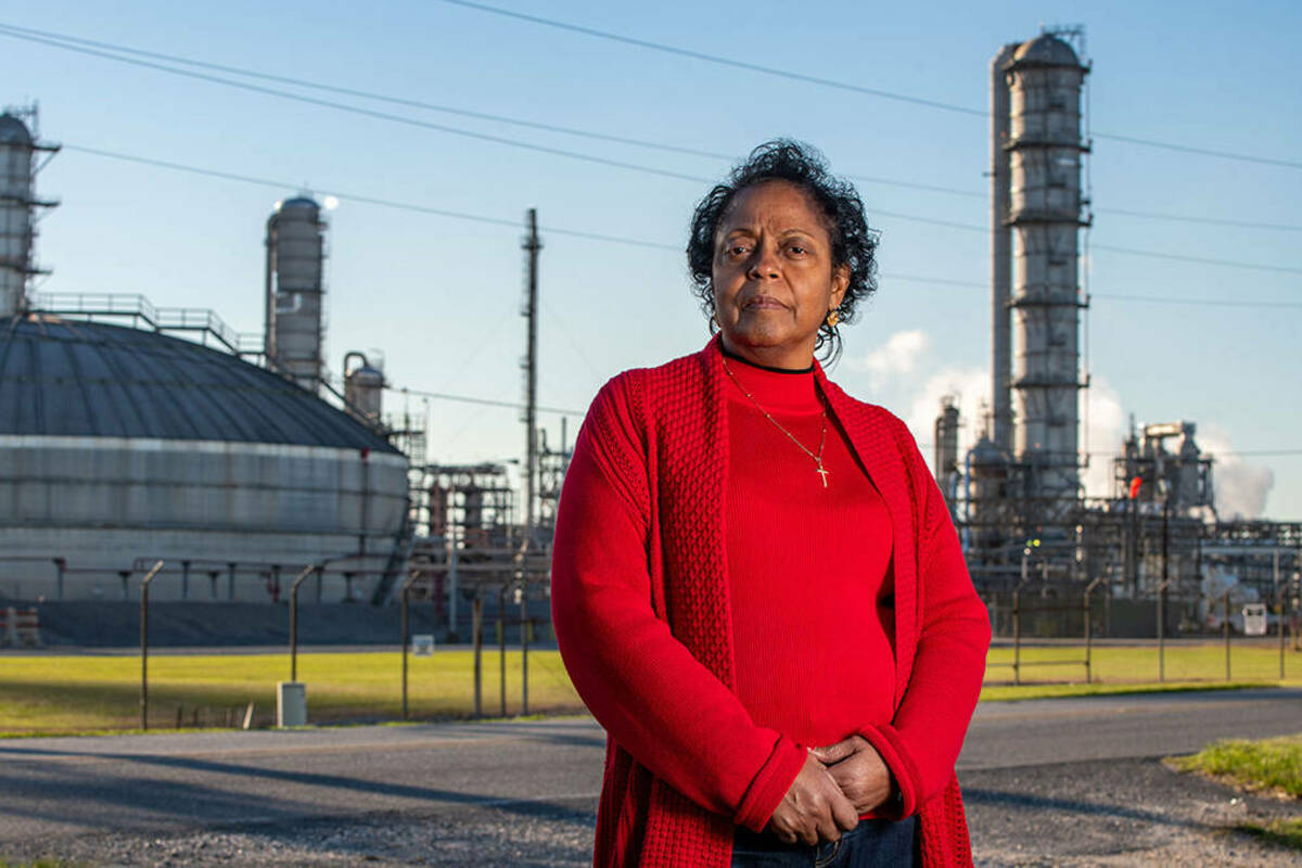 Rise St. James founder Sharon Lavigne stands in front of a chemical plant near her home in St. James Parish, Louisiana. (Photo by Barbara Johnston/University of Notre Dame)