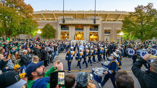 The Notre Dame Marching Band enters Notre Dame Stadium on a football game day, 2021. (Photo by Matt Cashore/University of Notre Dame)