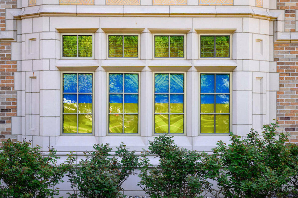 Windows of the Nanovic Institute in Jenkins-Nanovic Hall are covered in the colors of the Ukrainian flag. (Photo by Matt Cashore/University of Notre Dame)