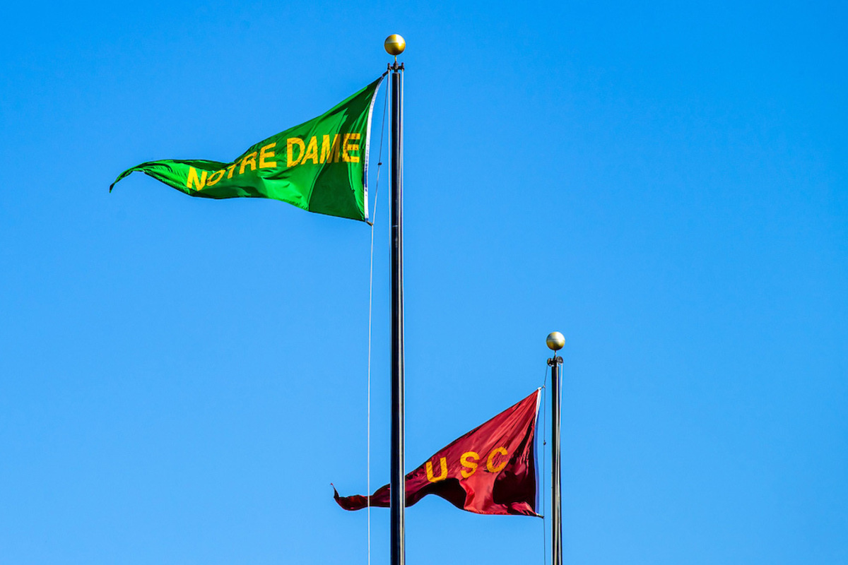 A green Notre Dame pennant flies over the north end of Notre Dame Stadium the week before the football game against USC. (Photo by Matt Cashore/University of Notre Dame)