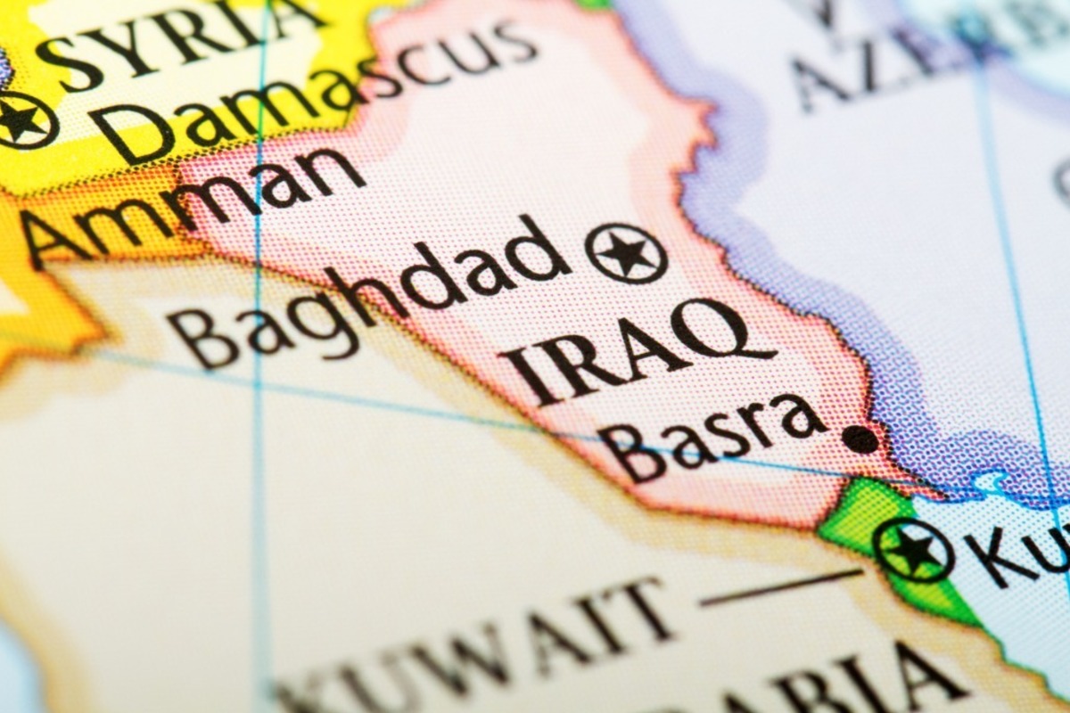 Close-up of a printed map centered on Baghdad, Iraq