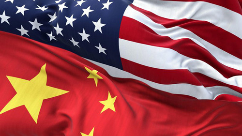 A graphic depicts the U.S. and Chinese flags enmeshed and merging in the middle where they overlap, representing U.S.-China relations.