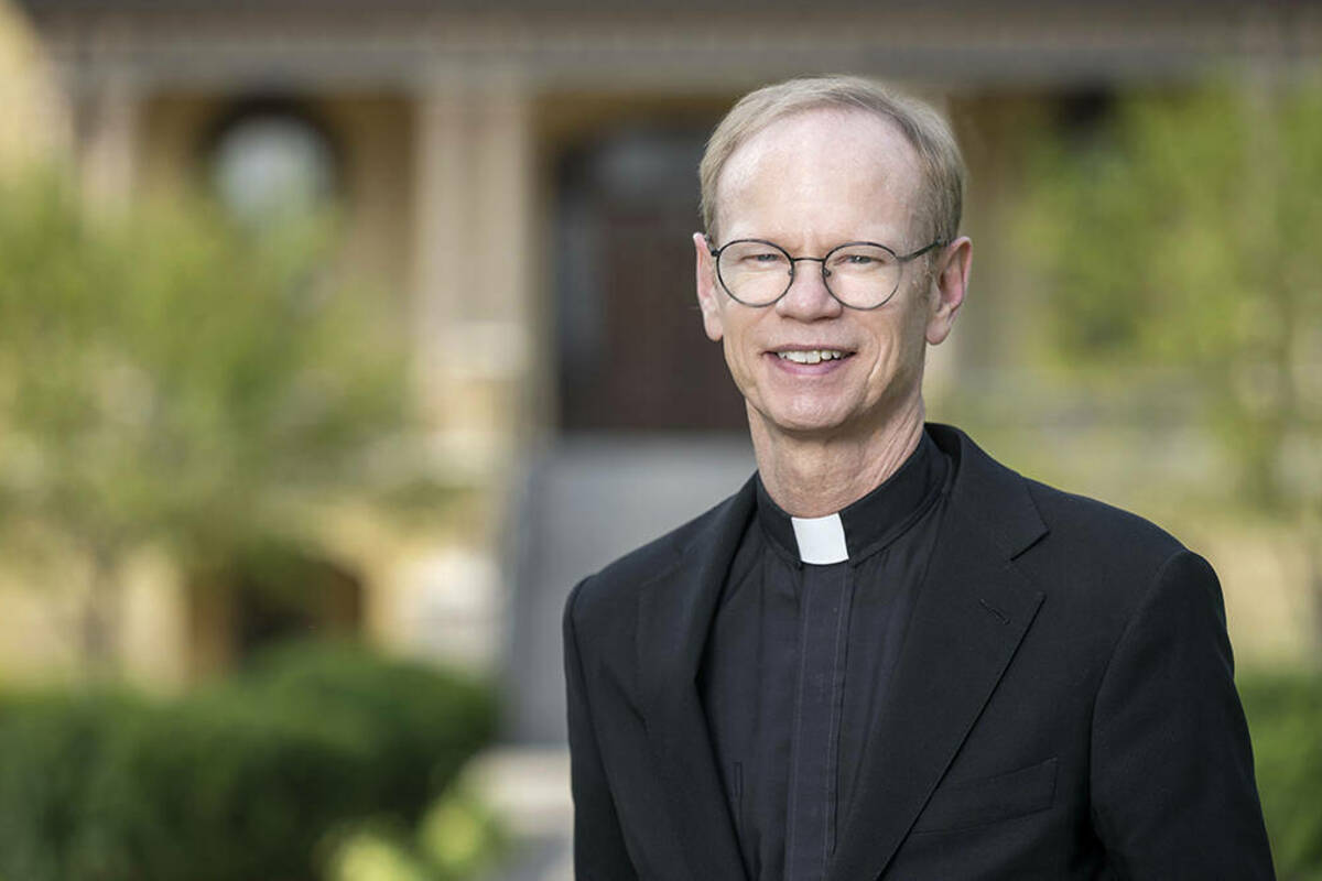 Rev. Robert A. Dowd, C.S.C., president of the University of Notre Dame, outside the Main Building