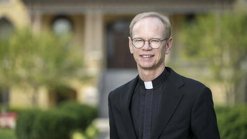 Rev. Robert A. Dowd, C.S.C., president of the University of Notre Dame, outside the Main Building