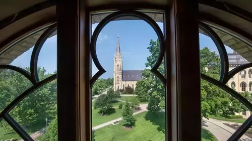 A view of the Basilica from a wrought iron window in Washington Hall.