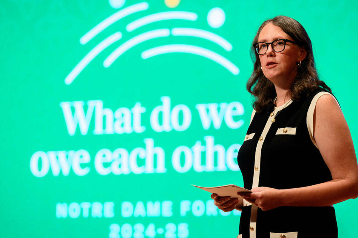 Meghan Sullivan, founding director of Notre Dame's Institute for Ethics and the Common Good, introduces the second session of 2024 Notre Dame Forum, themed ‘What do we owe each other?’ (Photo by Matt Cashore/University of Notre Dame)