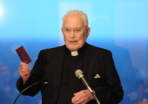 Father Hesburgh holds Irish passport