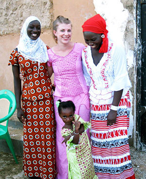 Peace Corps volunteer Lisa Floran with her host family in Senegal